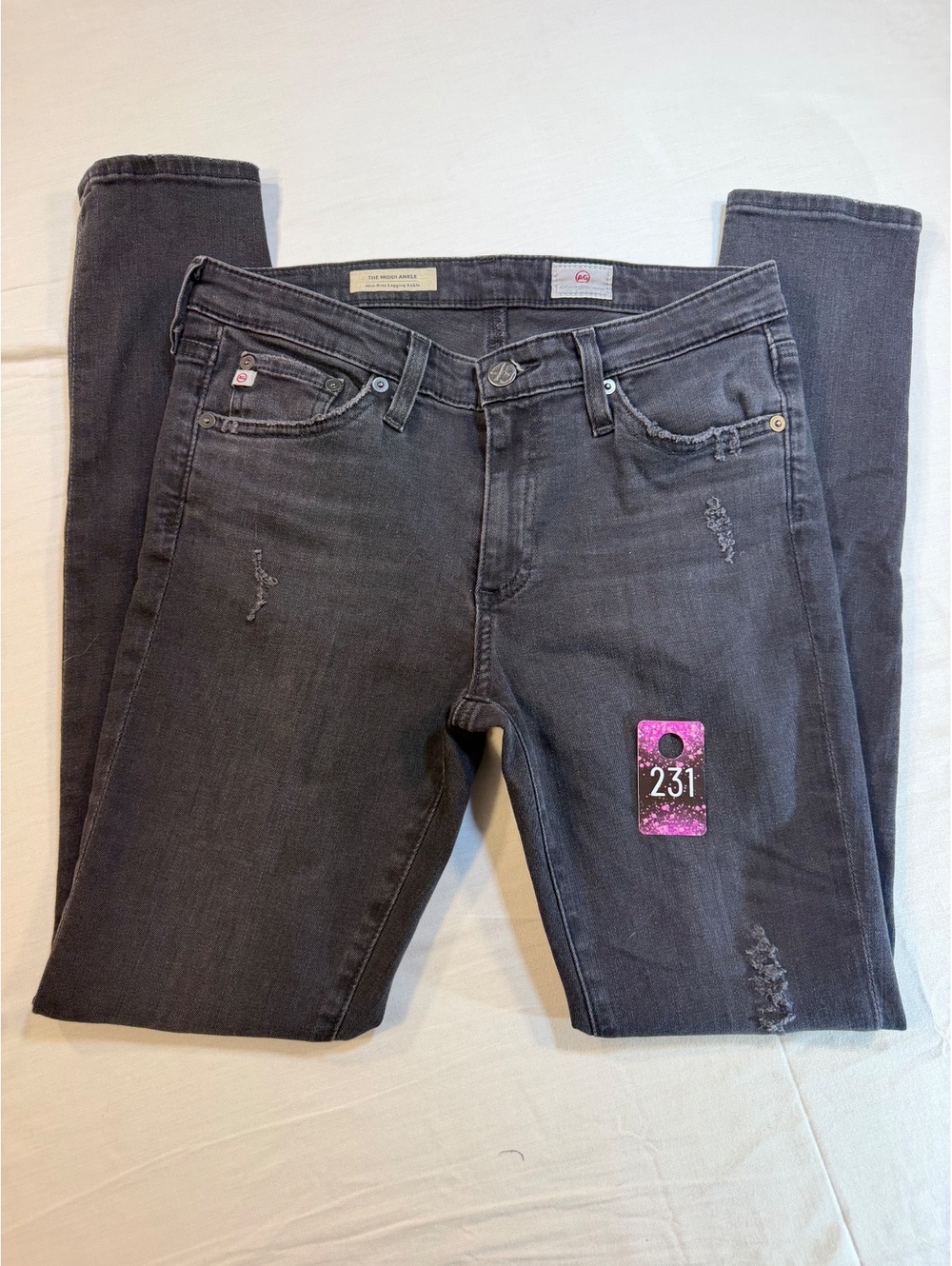 AG The Middi Ankle Mid-Rise Legging Ankle Jeans in Black Distressed Wash